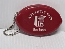 VTG QUIKOIN Atlantic City New Jersey Squeeze Red Coin Purse Keychain Made In USA