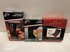 Lot Of 3 wine accessories; Vacuum Wine Saver, Wine Cooler, Wine Accessory Set.