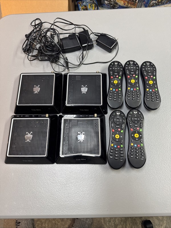 Lot of 4 TiVo Minis TCDA93000 - With Remotes, & Power Adapters- AS IS