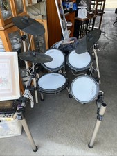 Simmons Titan 50 Electronic Drum Kit with Mesh Pads and Bluetooth LN Chair