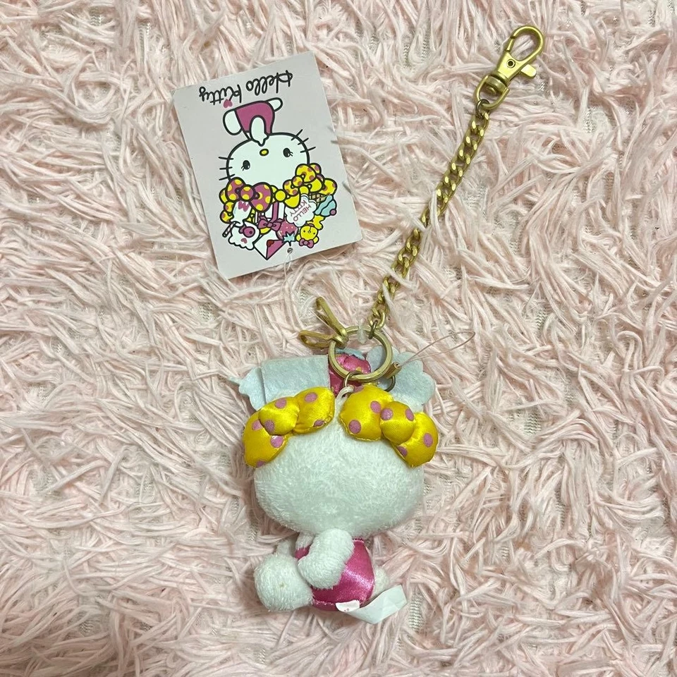 Porte-clés Hello Kitty ruban coloré breloque rare vintage avec usure - Photo 2/4