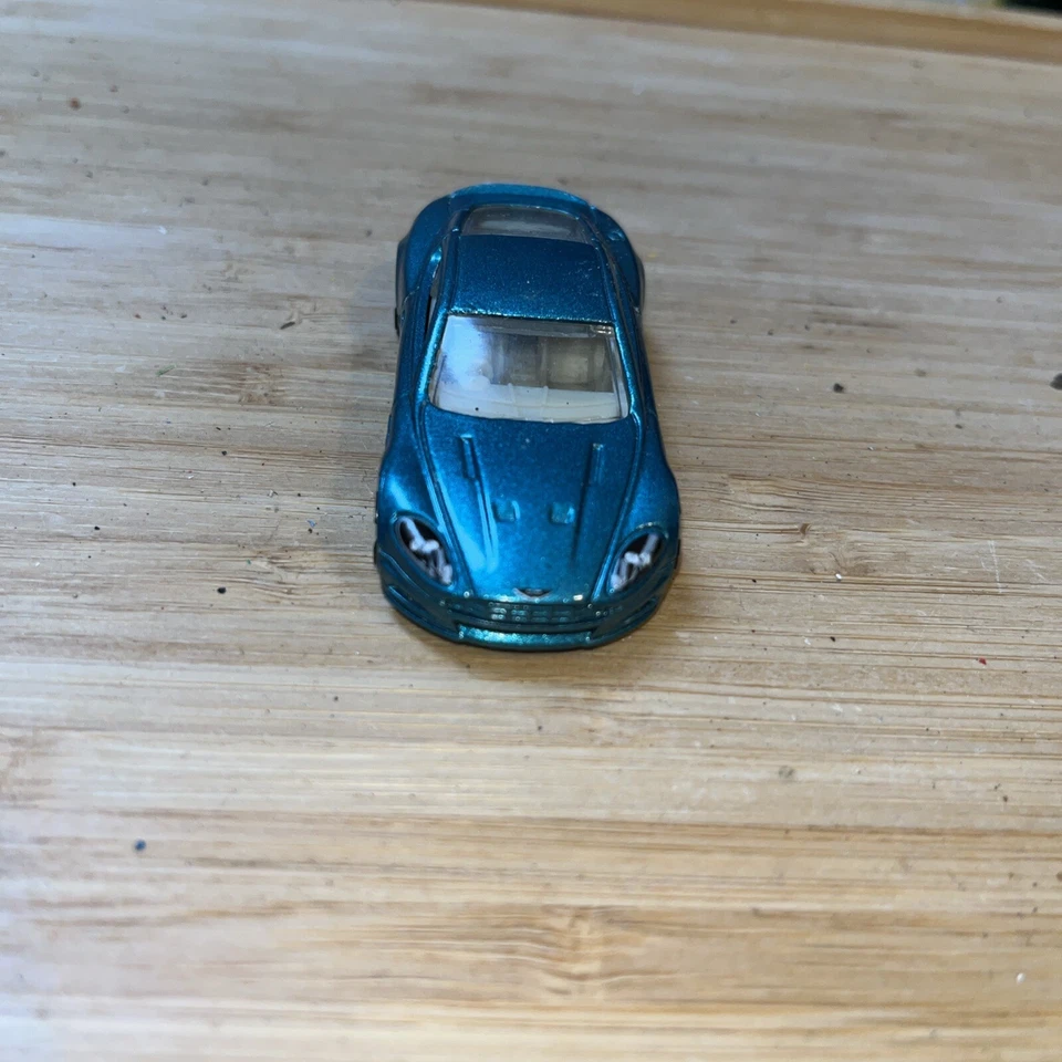 Hot Wheels Aston Martin DBS Metalflake Teal Gold FTE2 Faster Than Ever 1:64 #151 - Image 2 of 4