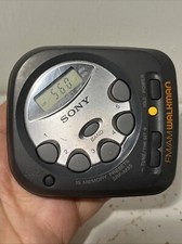 Sony Walkman SRF-M35 FM/AM Stereo Clock Portable Radio W/ Belt Clip Tested A3