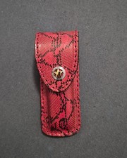 Custom sheath Fits Buck 110. Real Python skin dyed red. Heavy leather.
