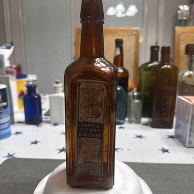 ANTIQUE AMBER GLASS BOTTLE OF PAINE'S CELERY COMPOUND Partial Paper Label 