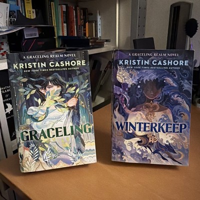 Pair of Graceling Realm Fantasy Books by Kristin Cashore Graceling Winterkeep PB