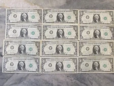 Lot of 12 1963 B $1 Federal Reserve Barr Notes