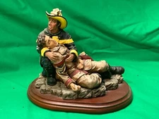 Red Hats of Courage by Vanmark Down but not out