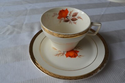Vintage Triumph American Limoges Vermillion Rose 22K Gold teacup and saucer