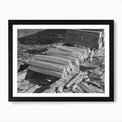 Pfahlhaufen mit Breitaxt ein gerahmtes Wandbild Poster Leinwanddruck Bild