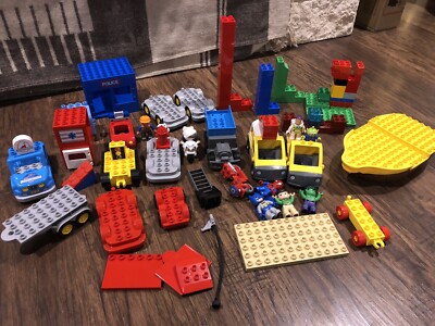 90 Pc Lot Assorted Lego Duplo Boys, 9 Mini figures, 13 Vehicles , Marvel,& Parts