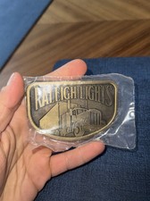 Vintage Raleigh Lights Semi Truck 18 Wheeler Trucker Brass Belt Buckle NOS