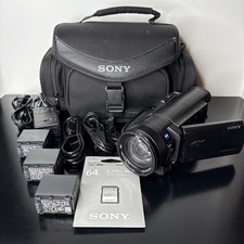 Sony Handycam FDR-AX100 4K Camcorder 3 OEM Batteries Case Sealed 64GB SD