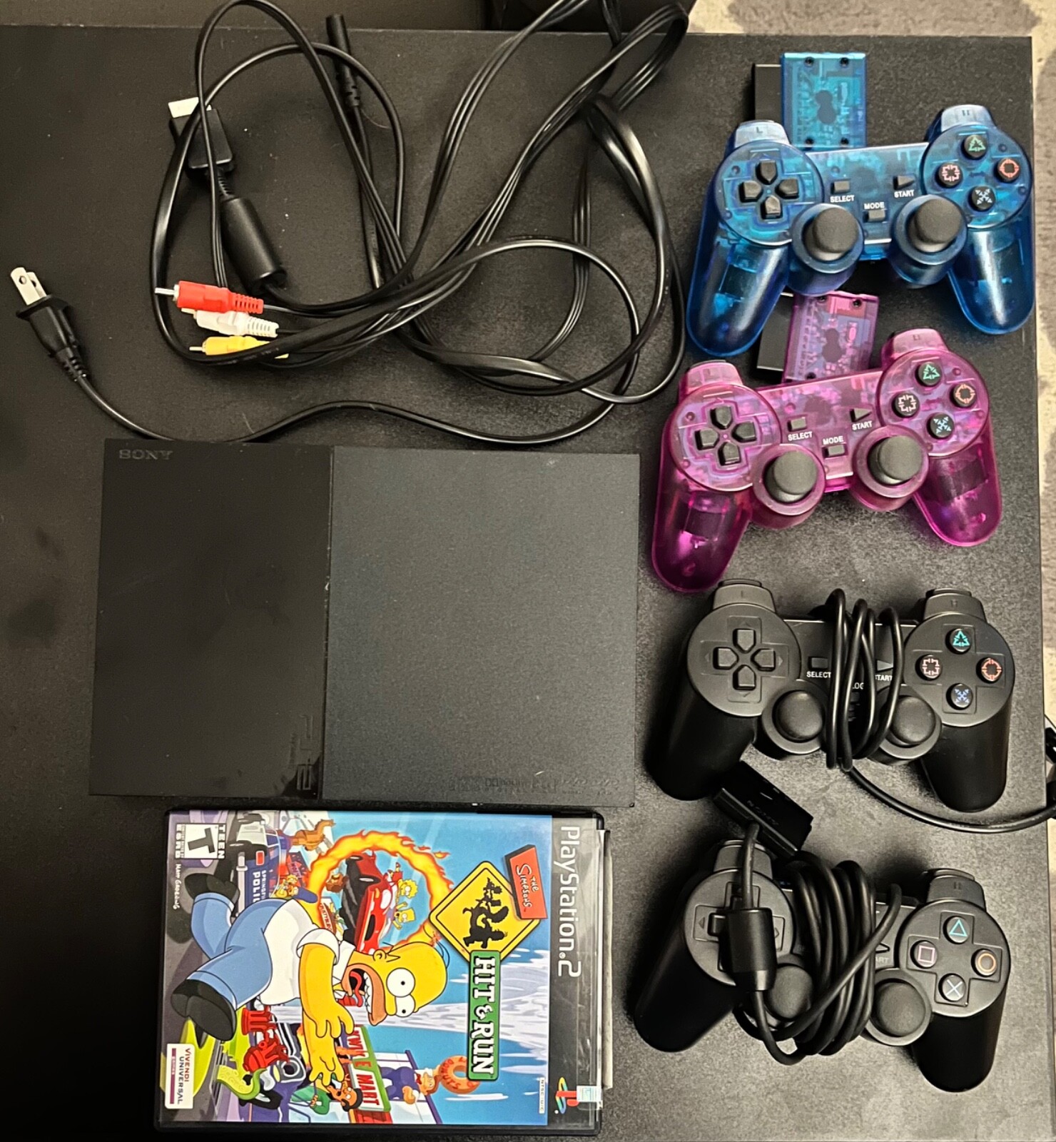 PlayStation 2 Slim Console Black-4 controllers 2 wired, 2 wireless w/ 1 game inc