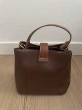Handbag With Zipper And Adjustable Strap
