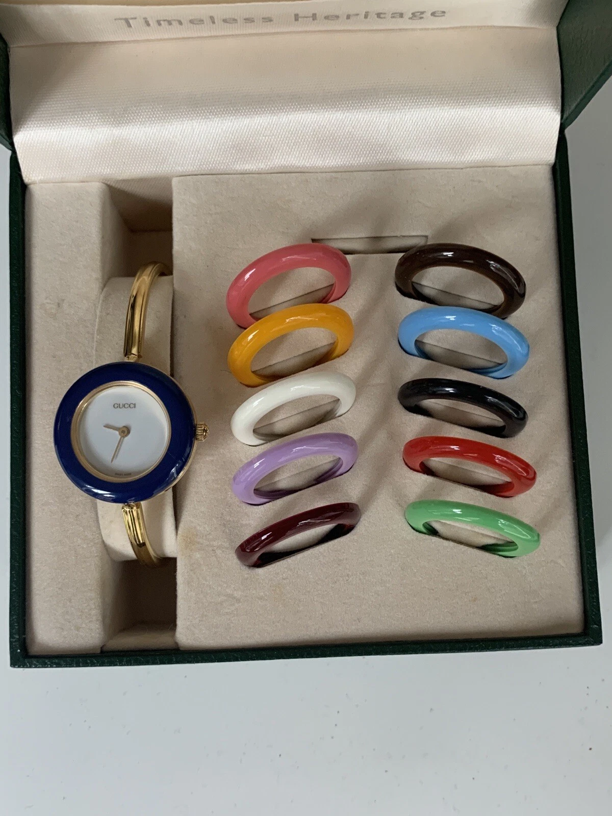[Presque comme neuve / boîte] Montre femme GUCCI lunette à changement 11/12,2 10 couleurs or