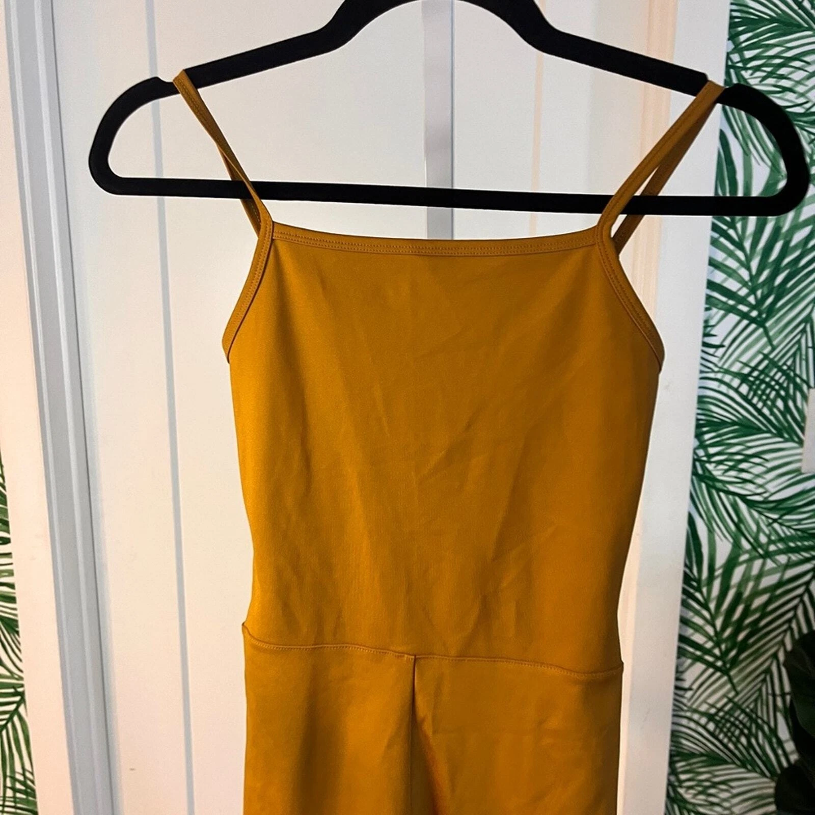 girlfriend-collective mustard one piece unitard 