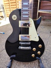 Vintage V99 LP Style Electric Guitar Black Gloss. Hard Case