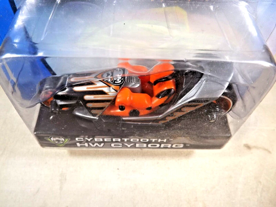 Hot Wheels Thunder Cycles Cybertooth HW 2003 Cyborg gris-negro con ruedas naranjas Foto 3 de 4