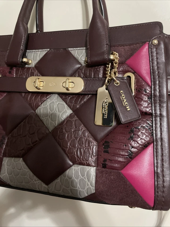 Bolso Bandolera Coach Swagger 27 Usado en Excelente Condición Mezcla Estampado Animal Cuero Edredón Foto 2 de 4