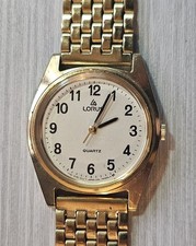 VTG. LORUS Men's Quartz Watch. Gold tone case. New battery Gold Color band.