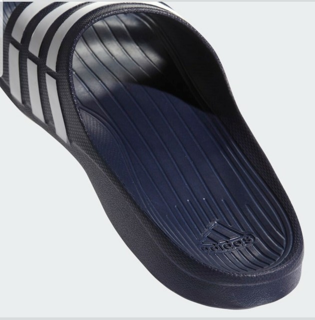dark blue adidas slides