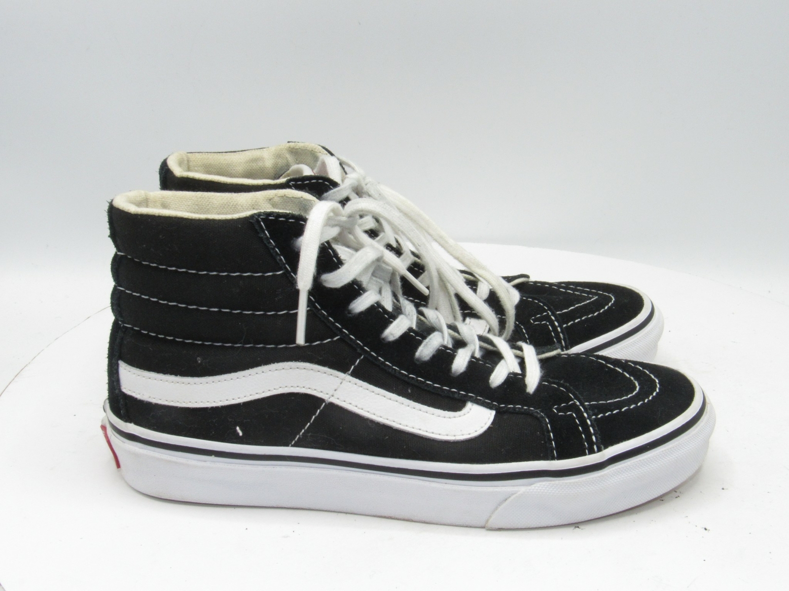 high top vans off the wall