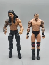 Lot of 2 WWE Action Figures 2011 Roman Reigns and 2017 Randy Orton