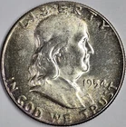 Toned 1954 90% Franklin Half Dollar UNC