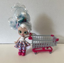 Muñeca Shopkins Real Littles Chrissy Puffs 5,5" pelo azul blanco con carrito de compras