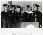 Press Photo Alaska University heads on the stage during commencement ceremonies — photo 1