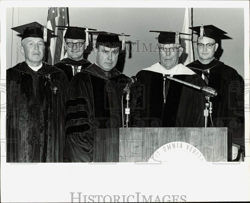 Press Photo Alaska University heads on the stage during commencement ceremonies