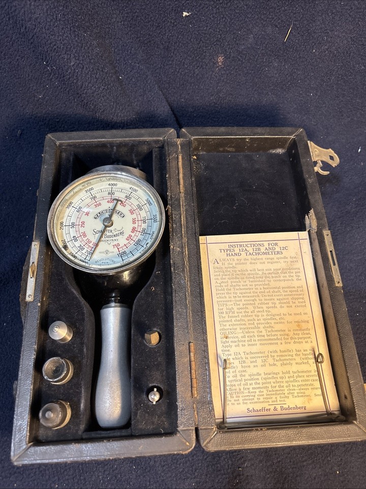 A brass Schaeffer & Budenberg vintage tachometer — a stunning piece of industrial-era precision engineering that doubles as desk art.