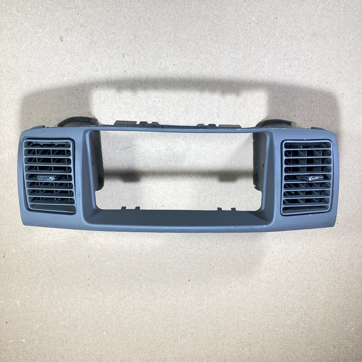 Instrument Cluster Finish Lower Center Toyota Corolla ZZE122