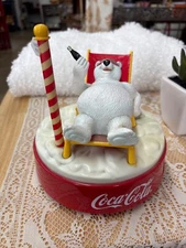 coca cola bear in lounge chair