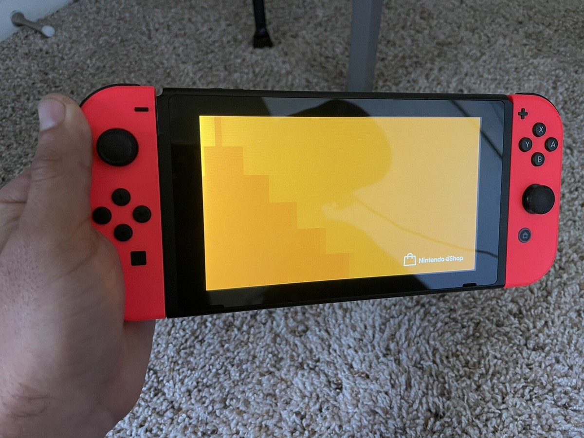 Nintendo Switch Super Mario Odyssey Edition (with Red Joy-Cons