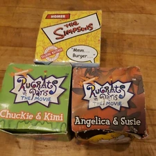 Lot of 3. Rugrats in Paris the Movie Chatback Watches and homer the simpsons. 