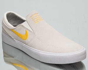 white and gold janoskis