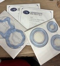 lot of 4 new creative memories. 2 pks 12 x 12 page protectors  2 cutting system