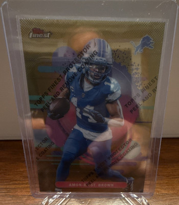 Topps Finest 2025 Finest Gold Peel-Off Amon-Ra St. Brown Lions #164 Serial /25