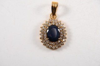 P65V48 Gold 585 14kt Anhänger mit Diamanten zus. ca. 0 80ct und Saphir ca. 2ct
