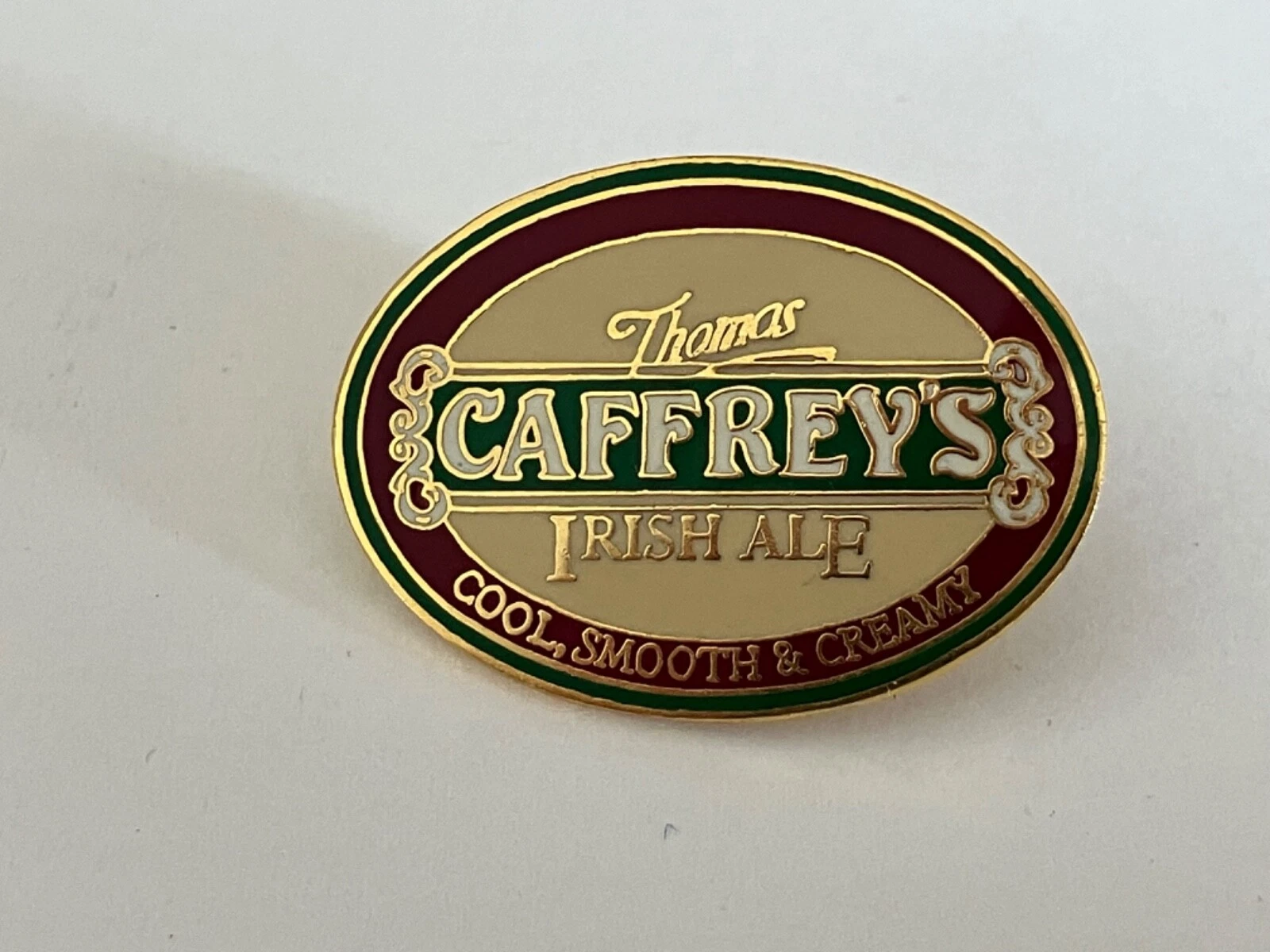 VINTAGE CAFFREYS IRISH ALE ENAMEL PIN BADGE
