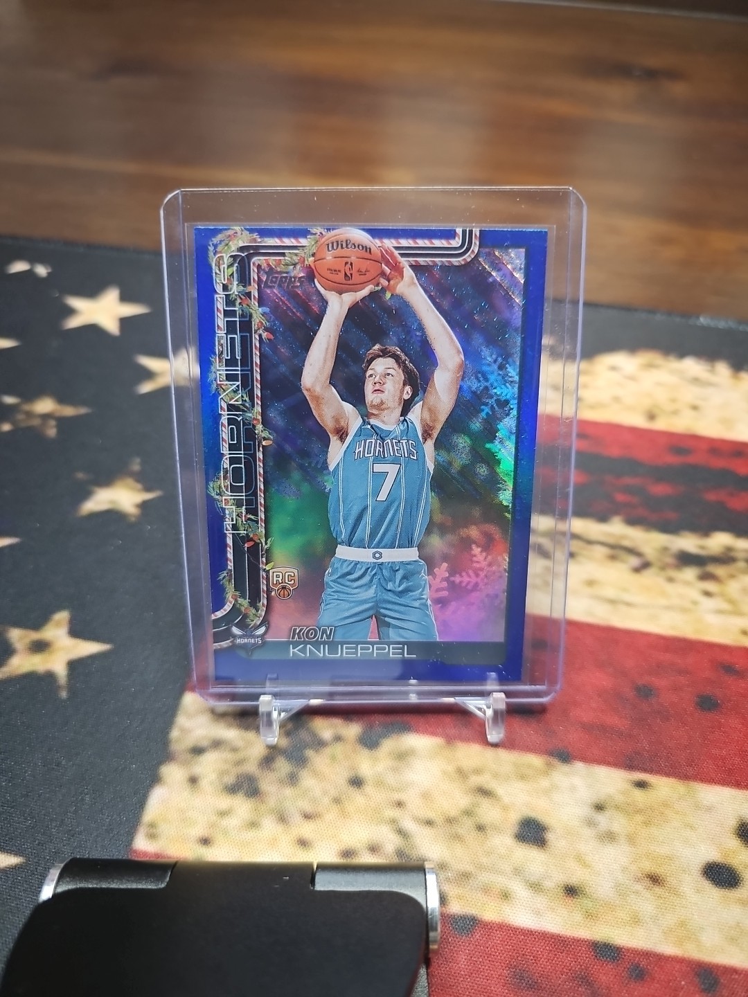 2025-26 Topps Holiday Kon Knueppel Blue Metallic Glitter Parallel (RC) #H164
