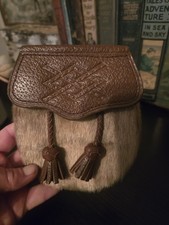 Leather And Fur Sporran With Celtic Design And Tassels.            C