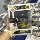 Funko Pop! Movies Bruce Lee #592 Vinyl Figure (Yellow Outfit) Bait Exclusive
