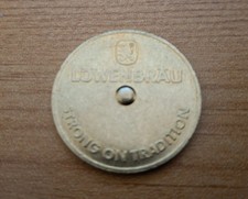 LOWENBRAU LAGER STRONG ON TRADITION YOU PAY SPINNER GAMBLING TOKEN / COIN