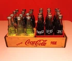 VINTAGE 3" 24 MINI COCA COLA, TOPO CHICO BOTTLES FOREIGN AND U.S.A WITH CRATES.