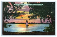 Postcard Boat Sailing at Sunset upon a Peaceful Lake in Florida Linen UNP