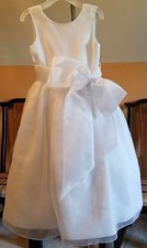 David  s Bridal soft white flower girl dress size 5 medium length only worn once.