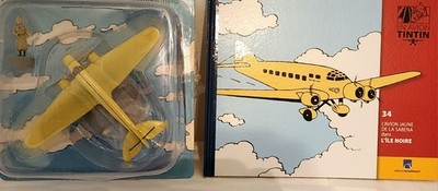 En avion Tintin n34, l'avion jaune de la Sabena, l'île noire